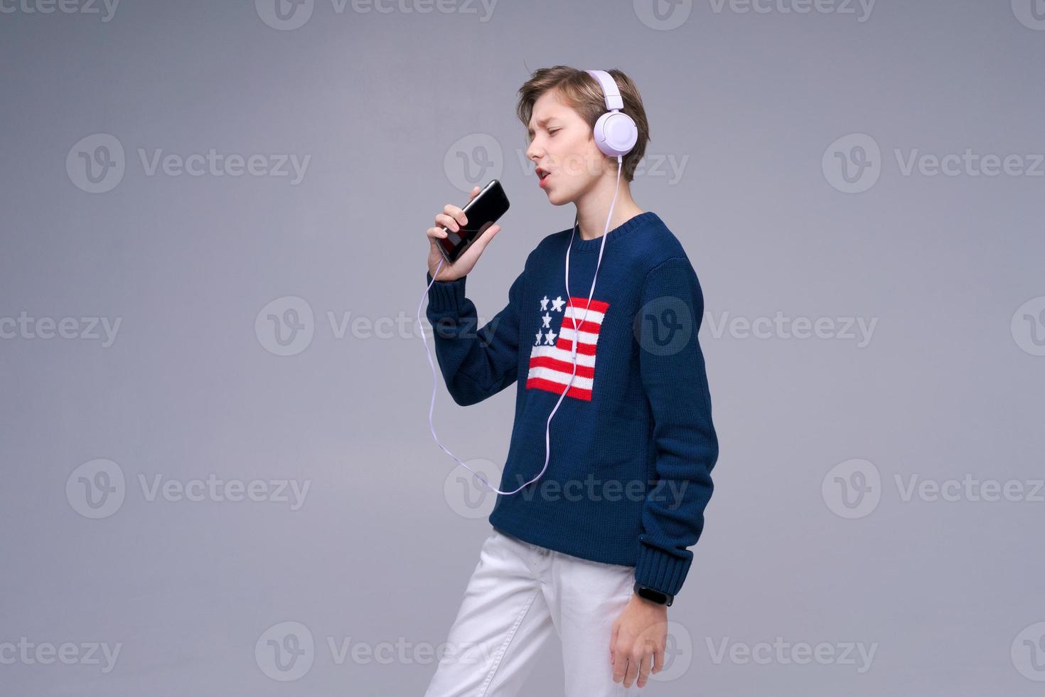 Young expressive singer lover joyful fun caucasian man in casual basic photo