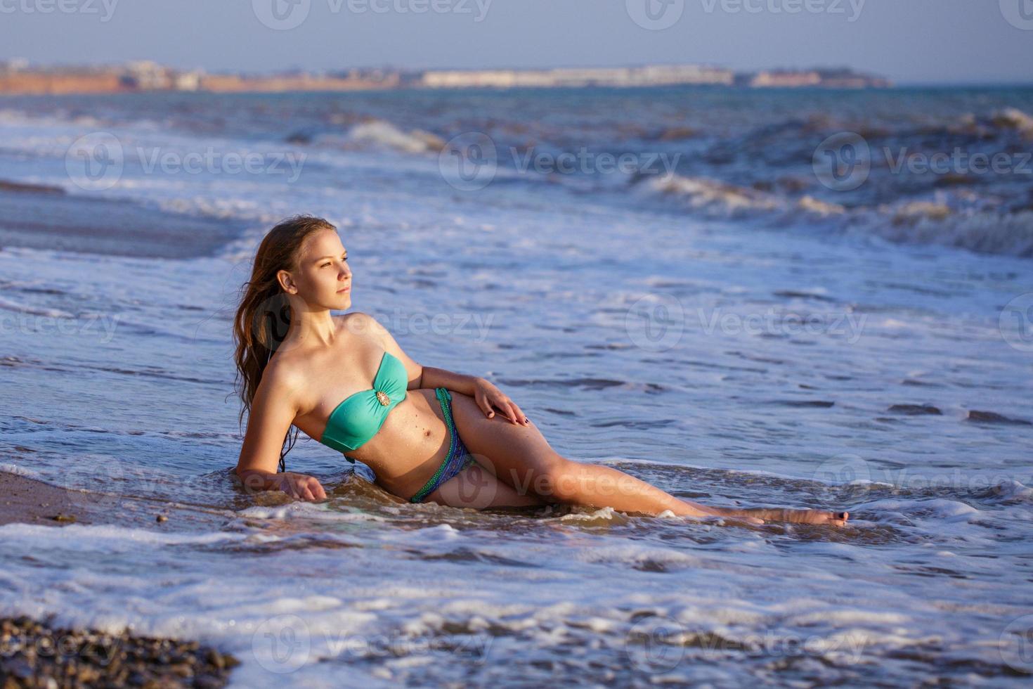 beautiful young girl in swimsuit photo