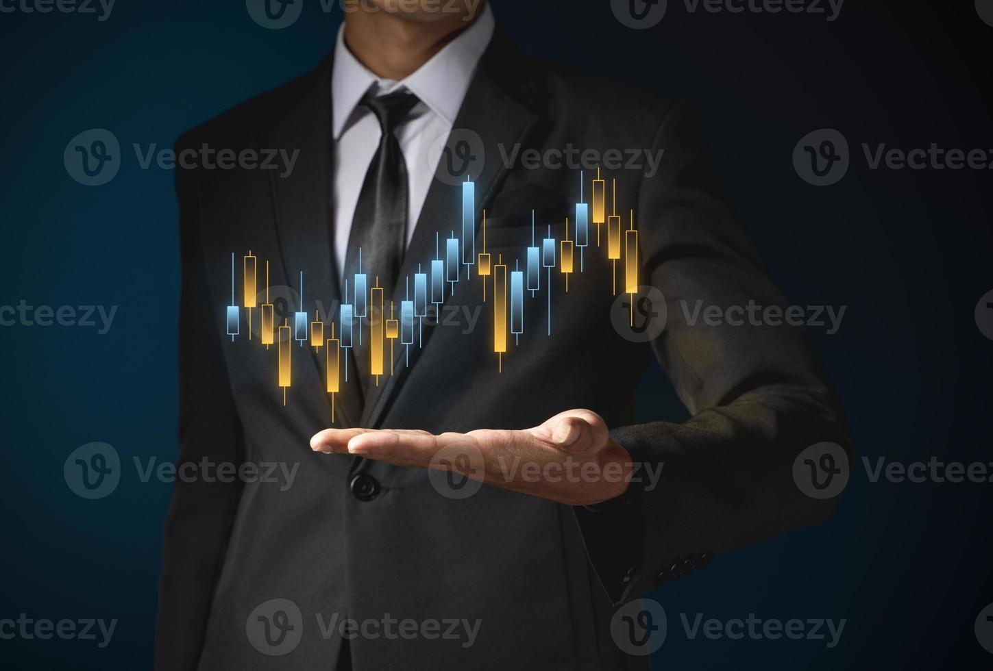trader is showing a growing virtual hologram stock, invest in trading. photo