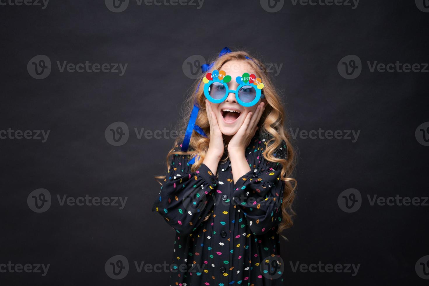 Portrait cute playful dreamy with toothy smile beautiful girl fooling around photo