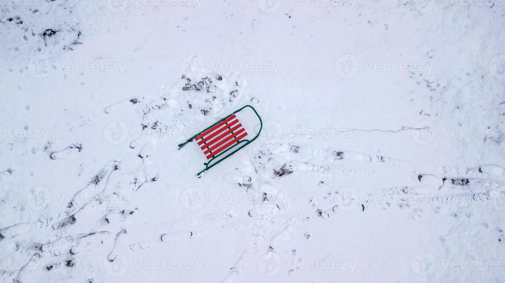 sled in the snow view from the quadcopter photo