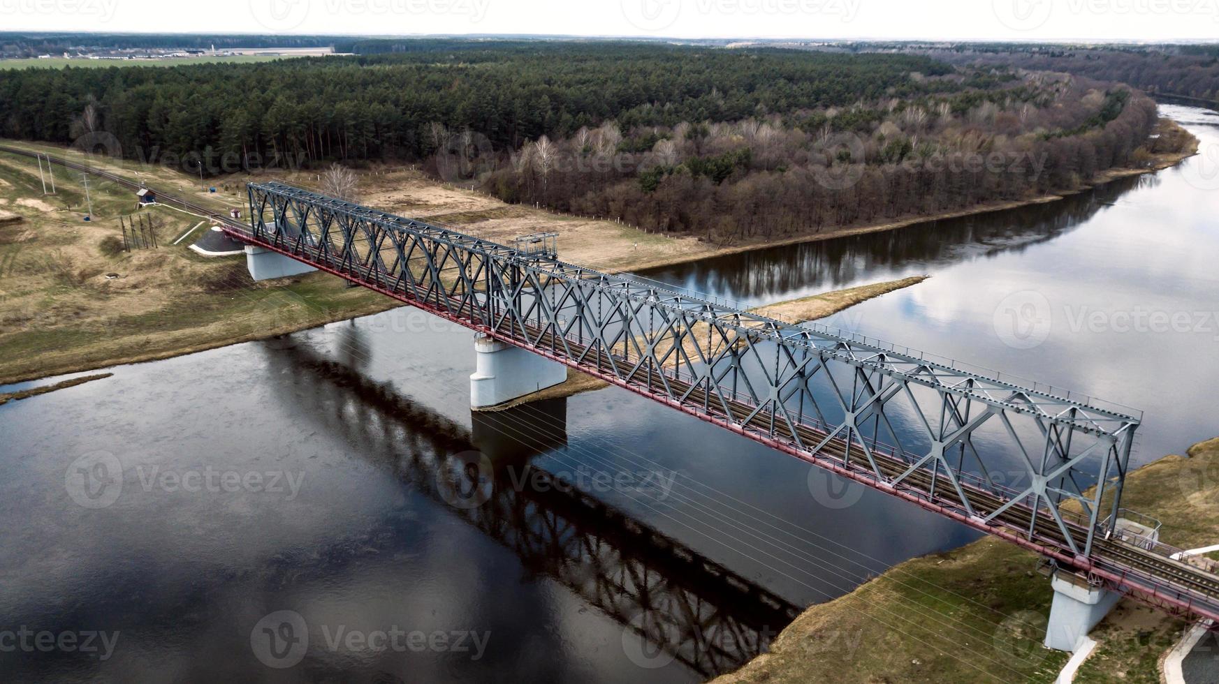 railway bridge over the river aerial photography with a drone photo