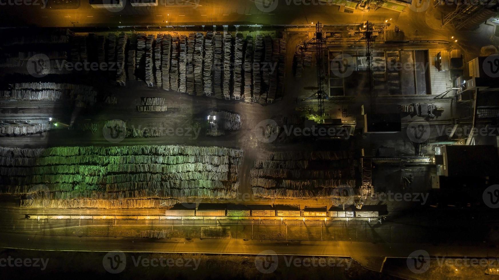 Night view of a wood processing factory. Aerial photography photo