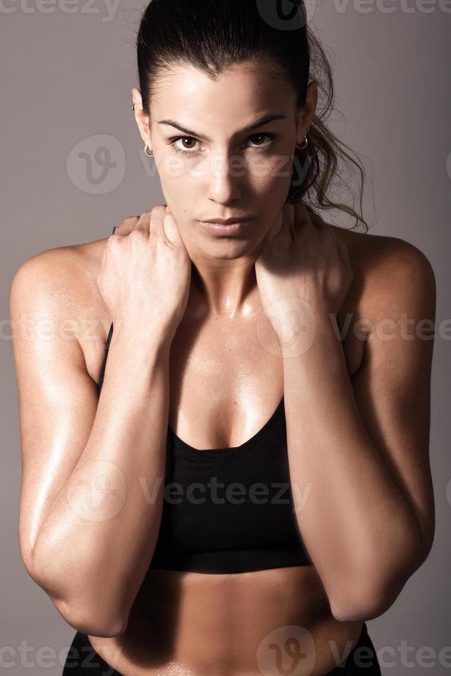 Woman, personal trainer, wearing black sportswear photo