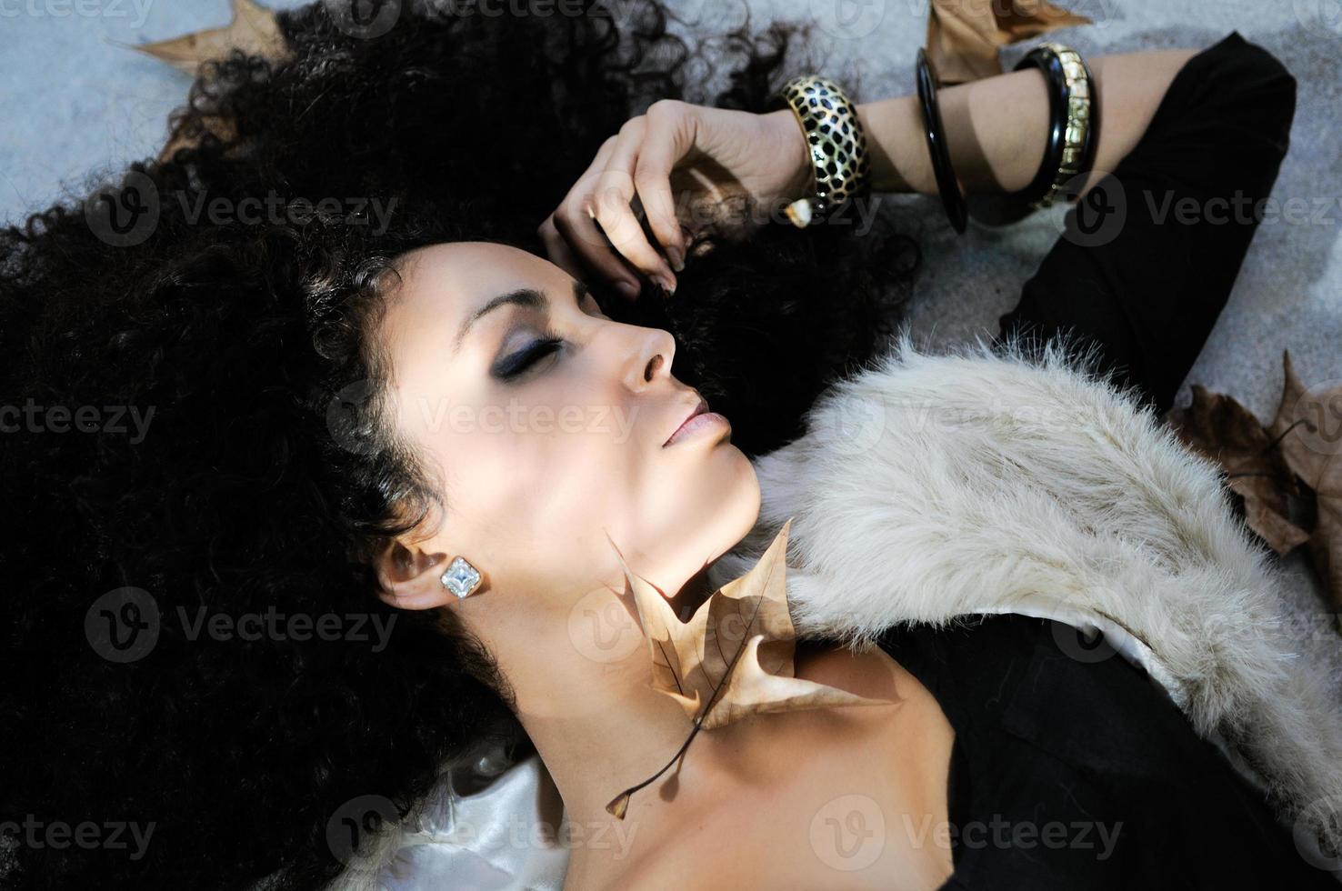 Portrait of a young black woman in the park photo