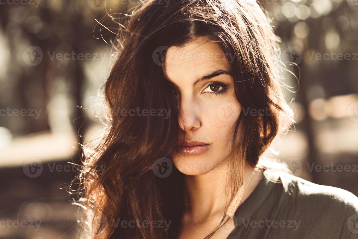 Beautiful woman in a urban park photo