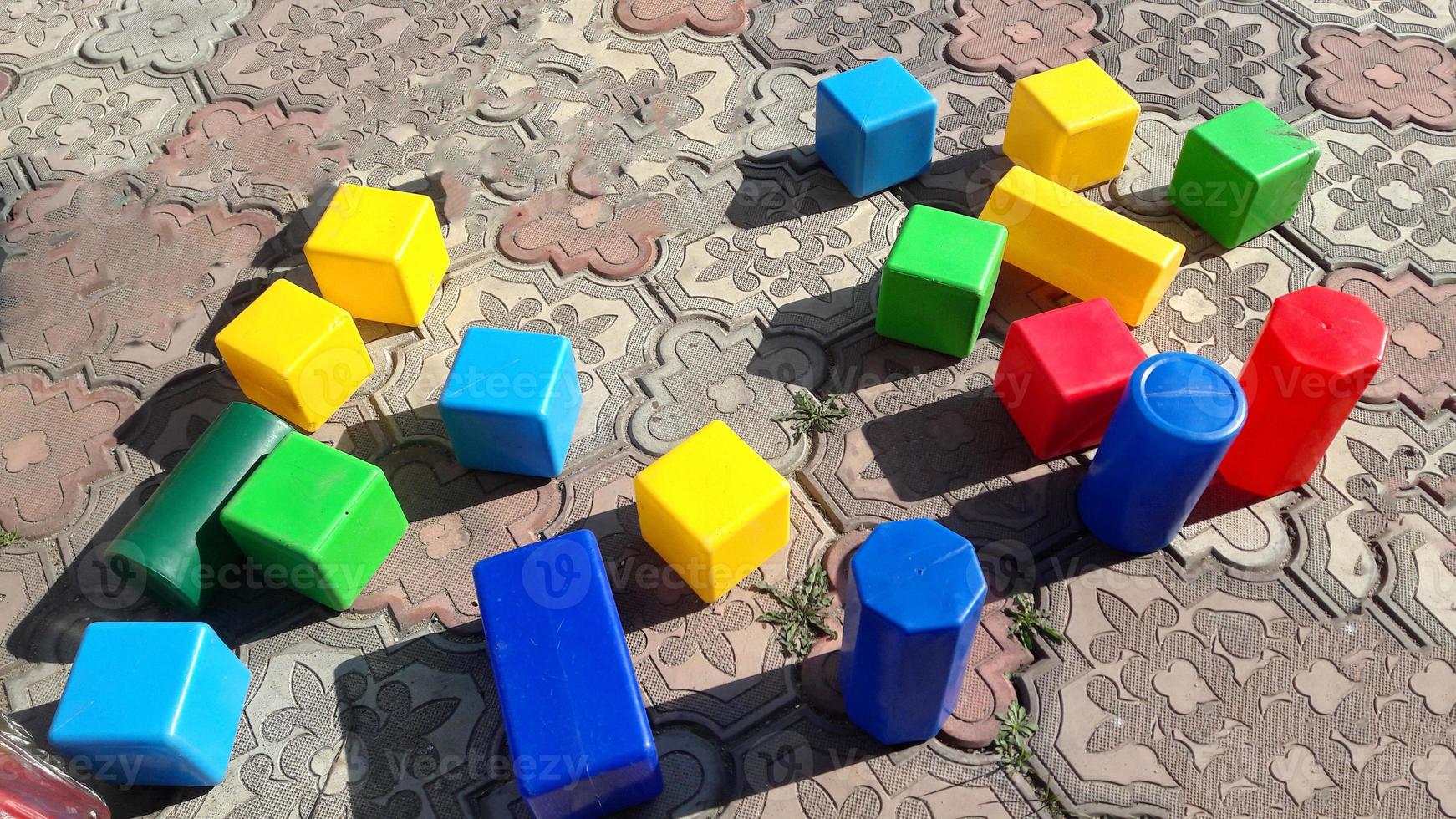 a lot of colorful foam cubes photo