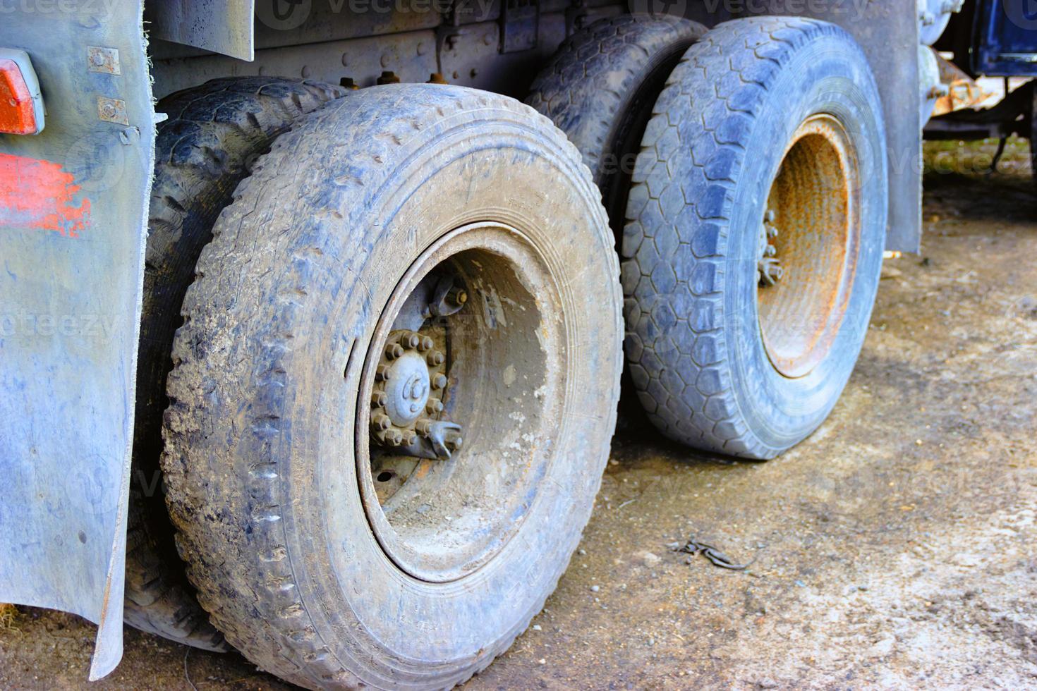 Double Wheels of a truck. Exhaust pipe. photo