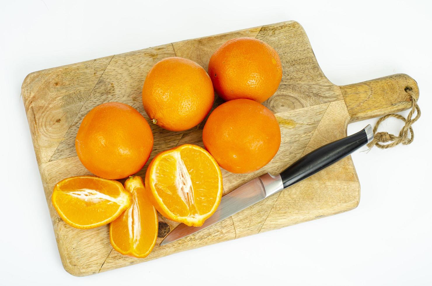 Large ripe sweet tangerines isolated on white background. Studio Photo