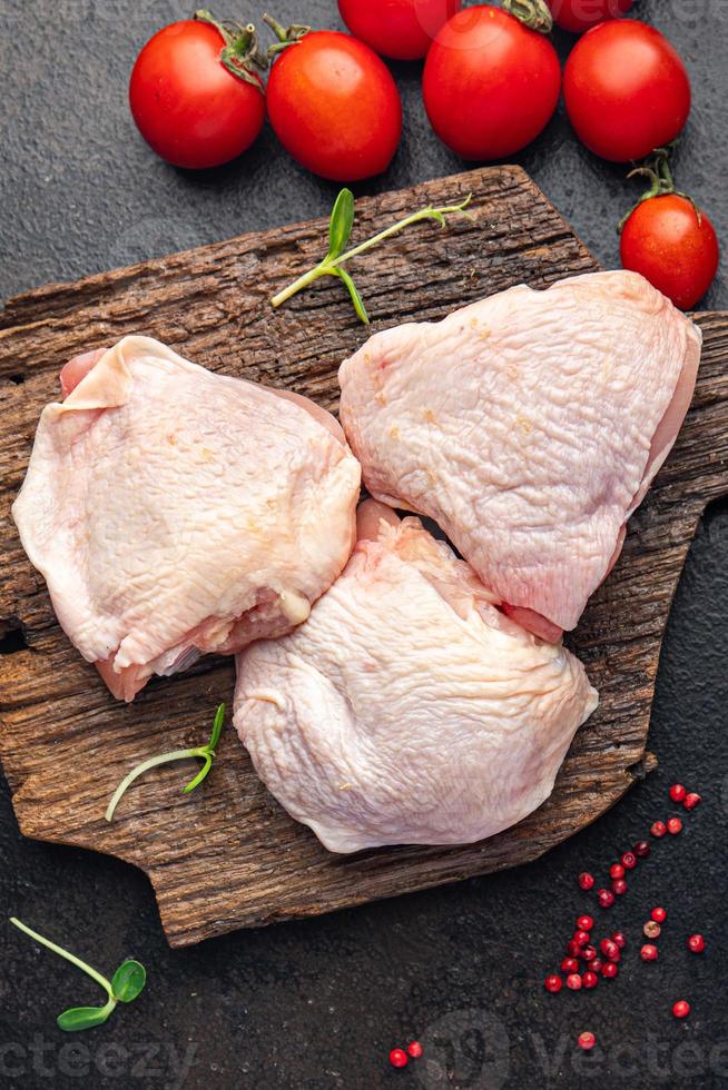 chicken thigh poultry raw meat fresh portion healthy meal food keto or paleo diet photo