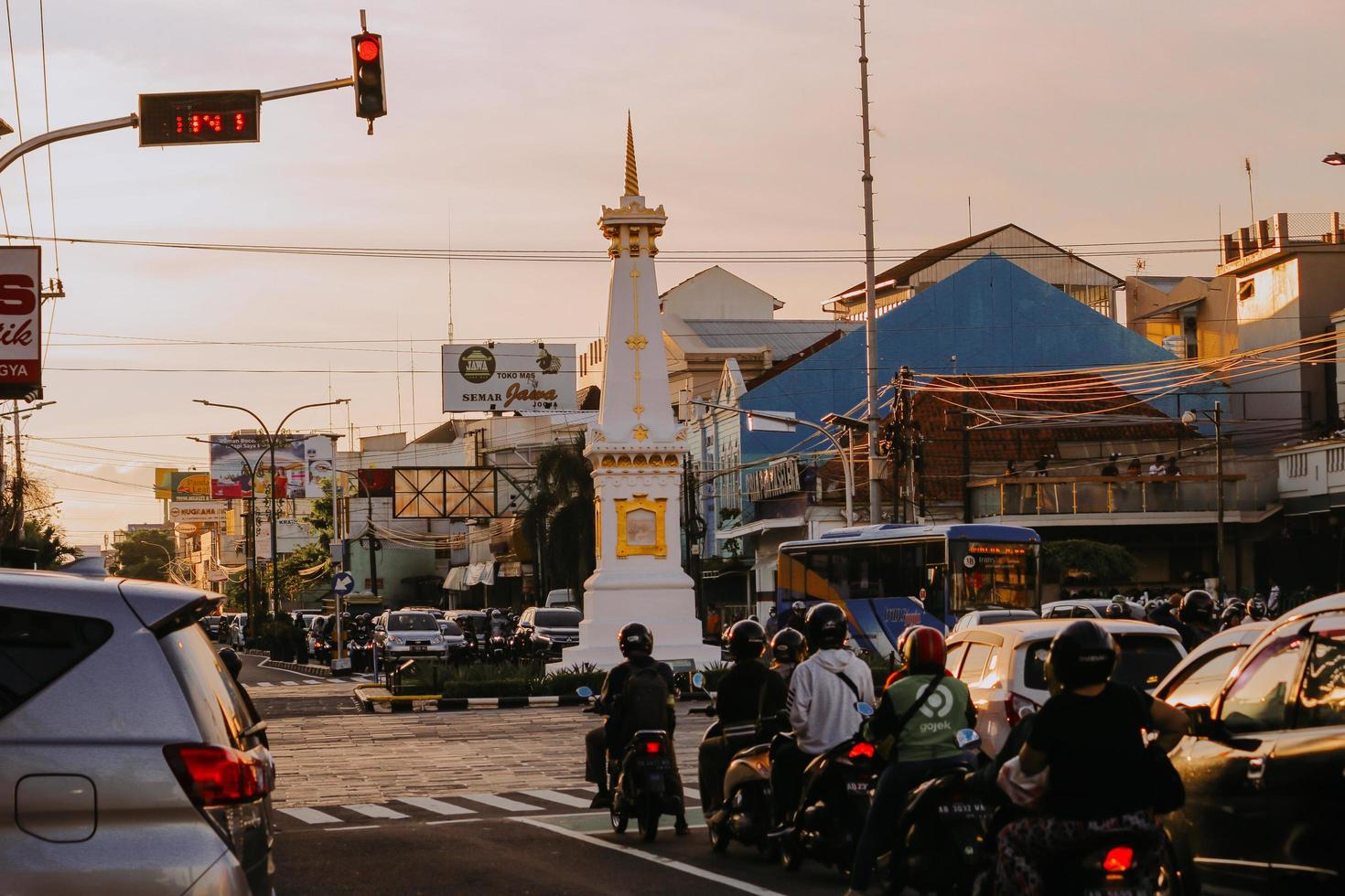 Yogyakarta, Indonesia, February 2020-Tugu Jogja with sunset photo