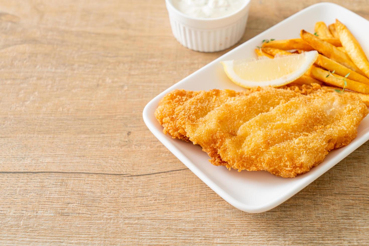 fish and chips - fried fish fillet with potatoes chips photo