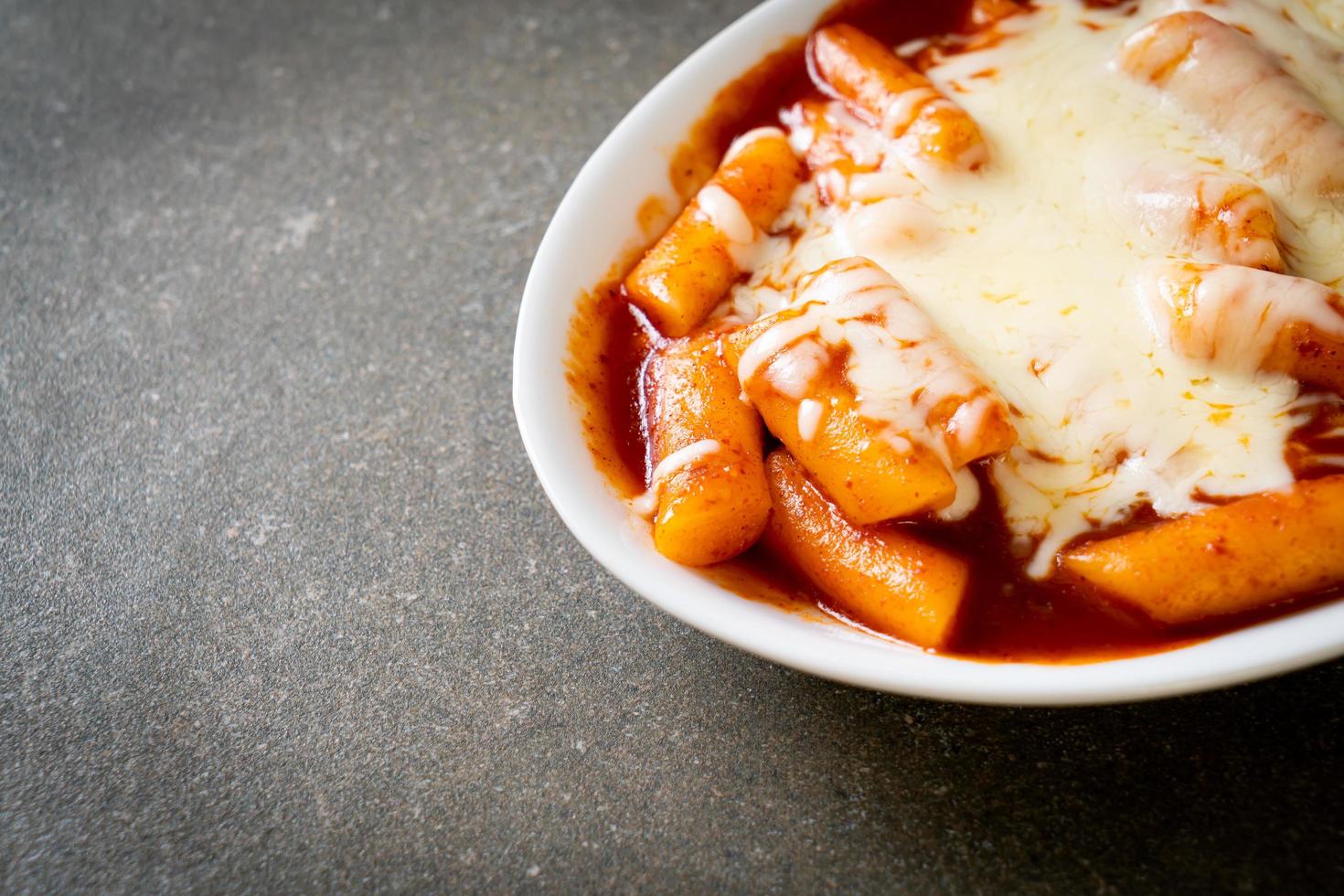 Korean rice cake in spicy Korean sauce with cheese, Cheese Tokpokki, Tteokbokki with Cheese photo