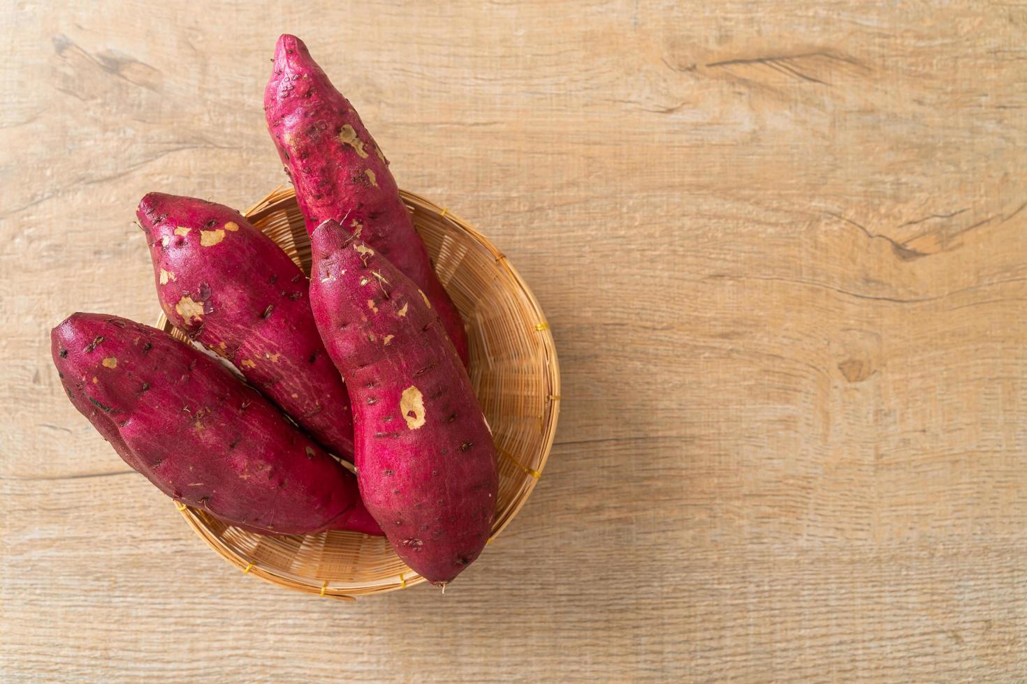 Japanese sweet potatoes on basket photo