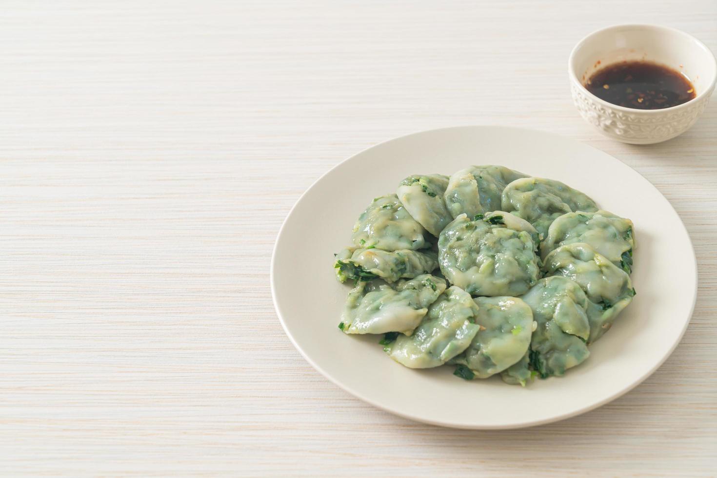 steamed chives dumplings with sauce photo