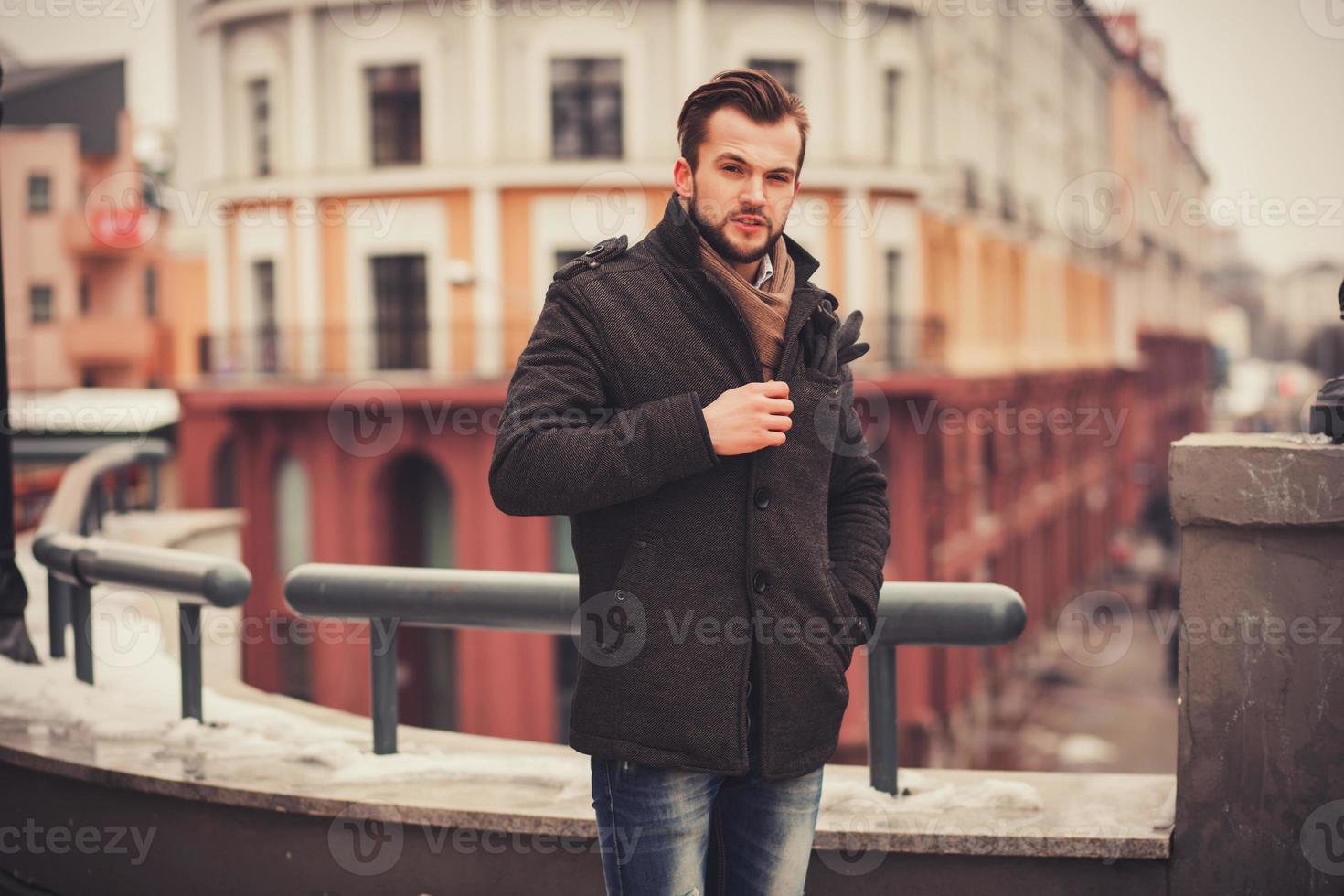 Handsome gentleman in city photo