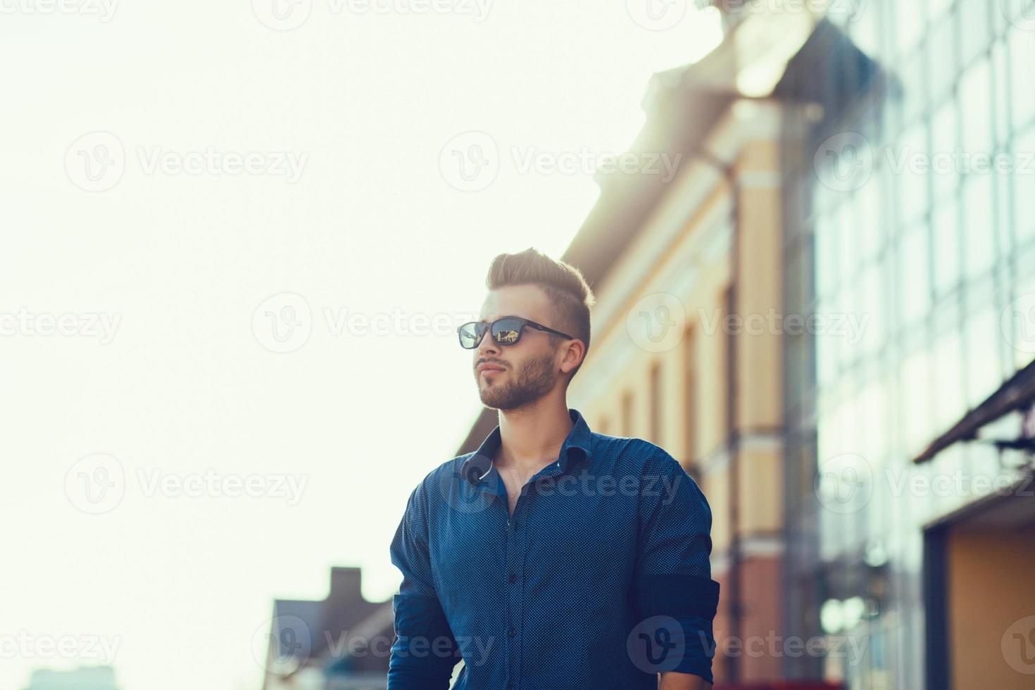 Handsome fashion model man photo