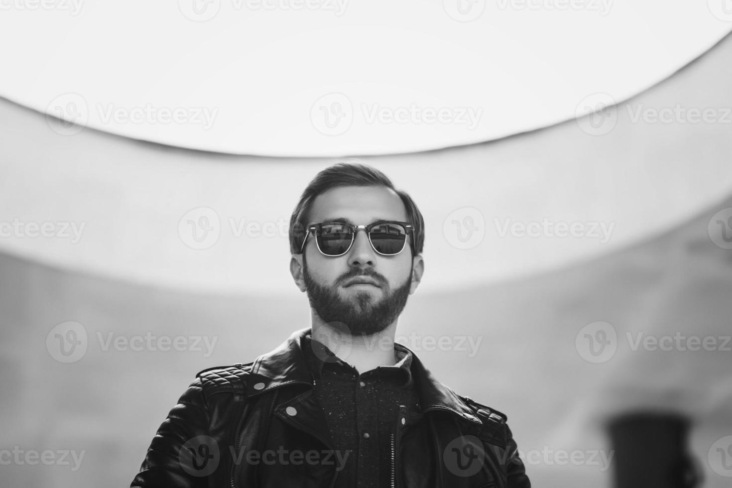 Handsome man in sunglasses photo
