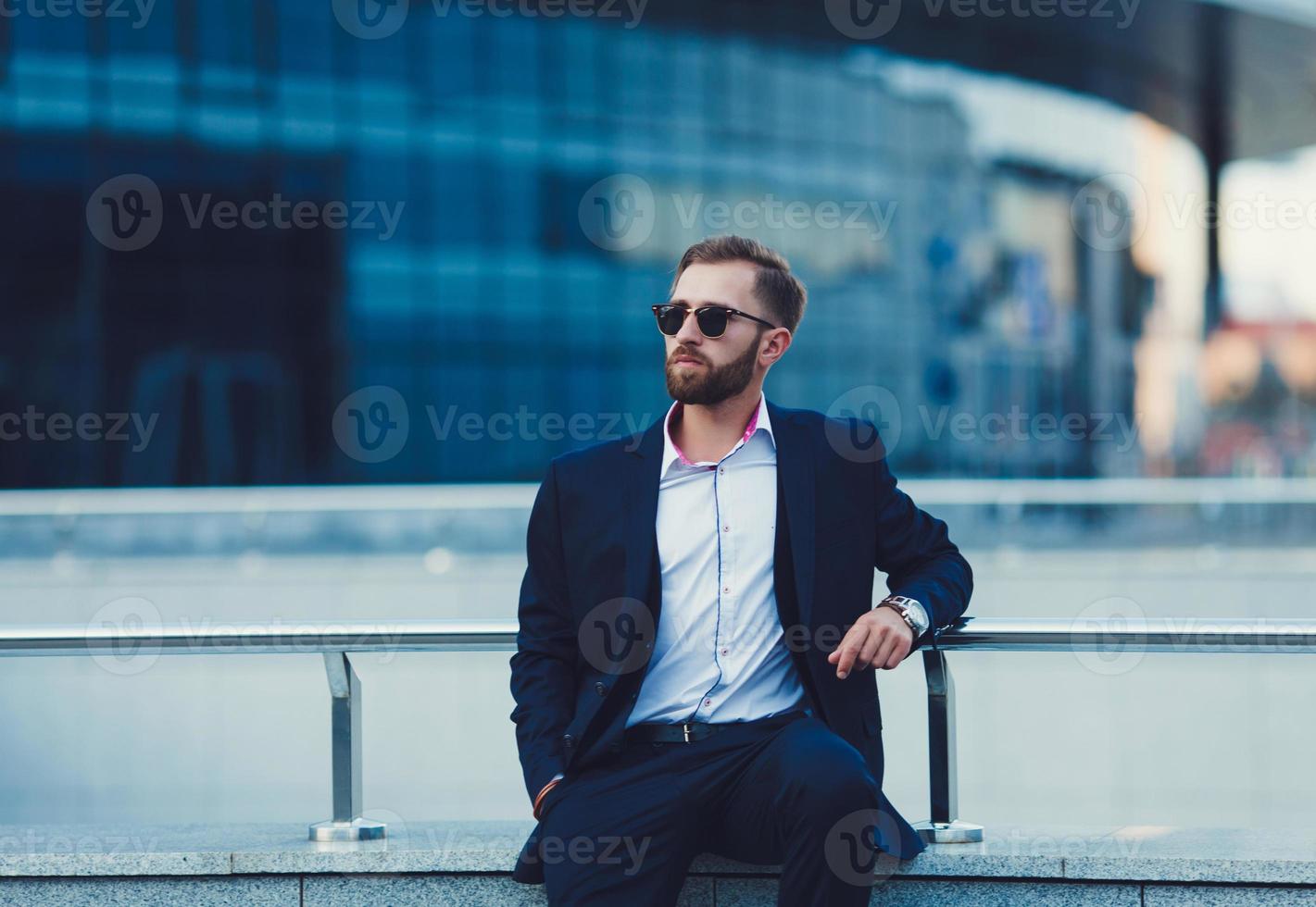 Young successful businessman in a suit photo