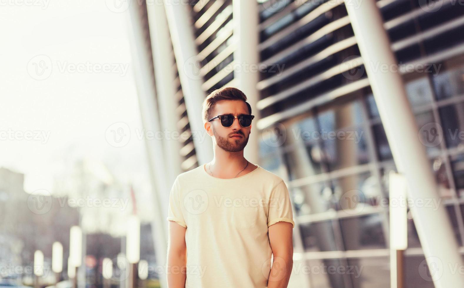 Man wearing white blank t-shirt photo