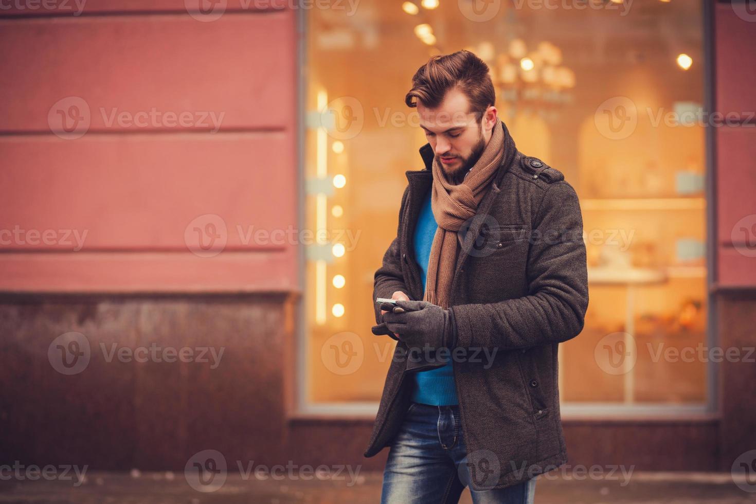 stylish man with a smartphone photo