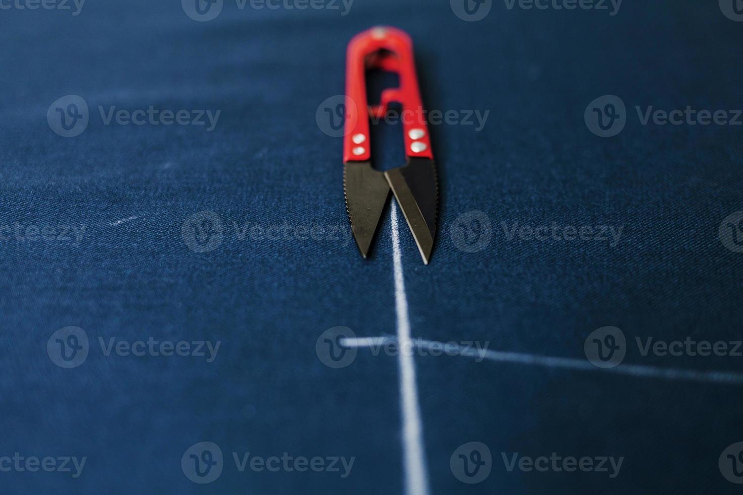 tailor's tool on table photo