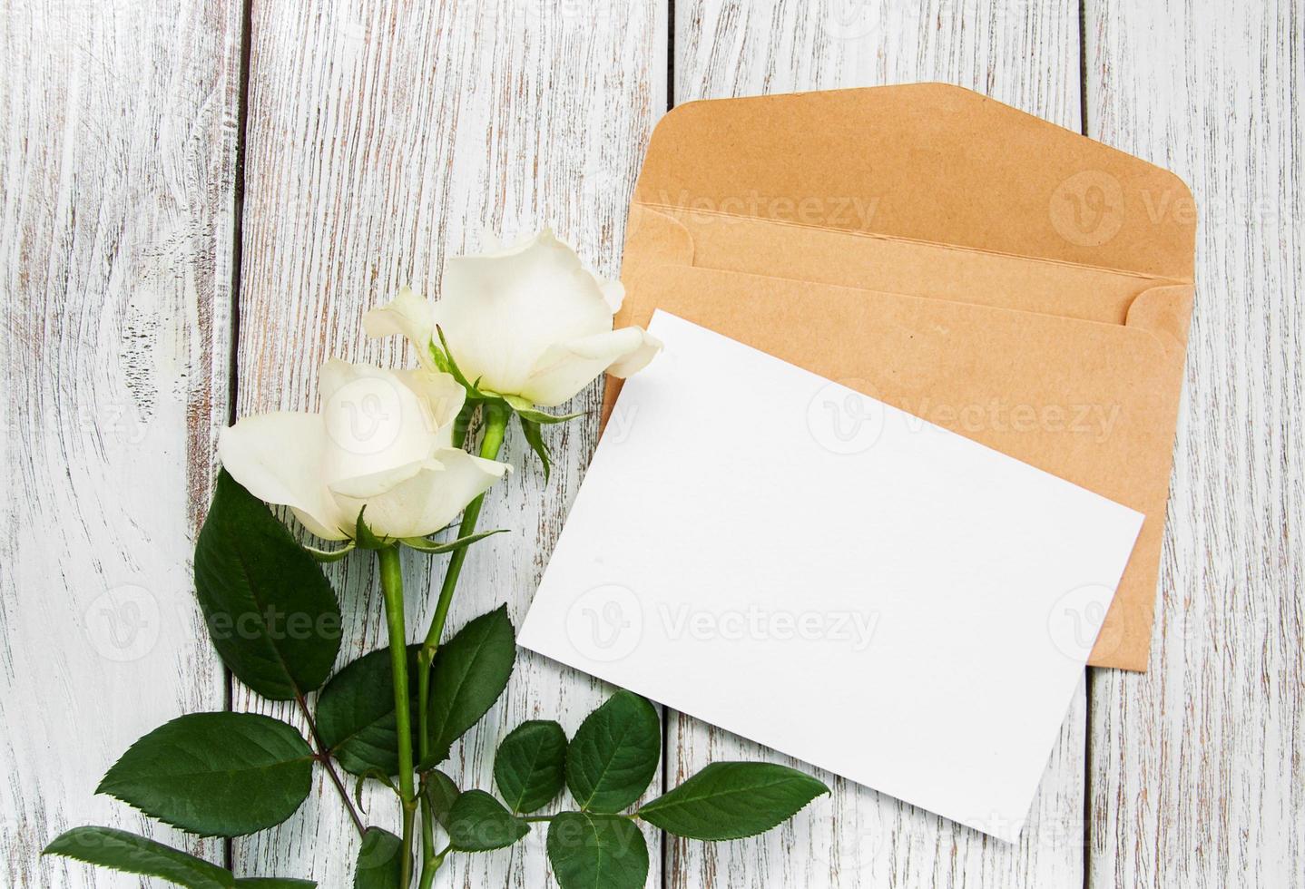 White roses and envelope photo