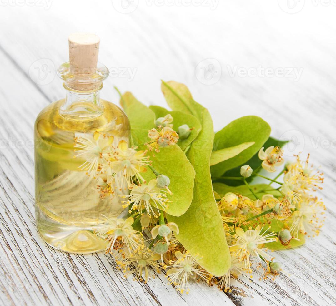 bottle of essential linden oil photo