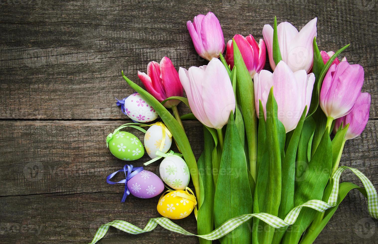 Easter eggs and tulips photo
