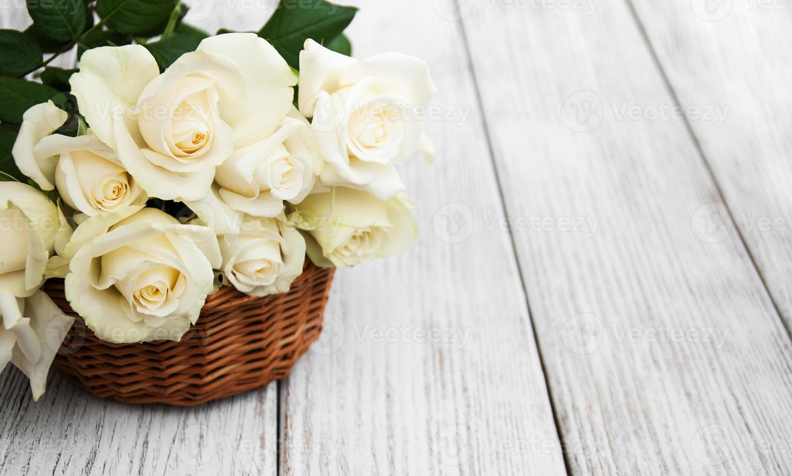 White roses in a basket photo