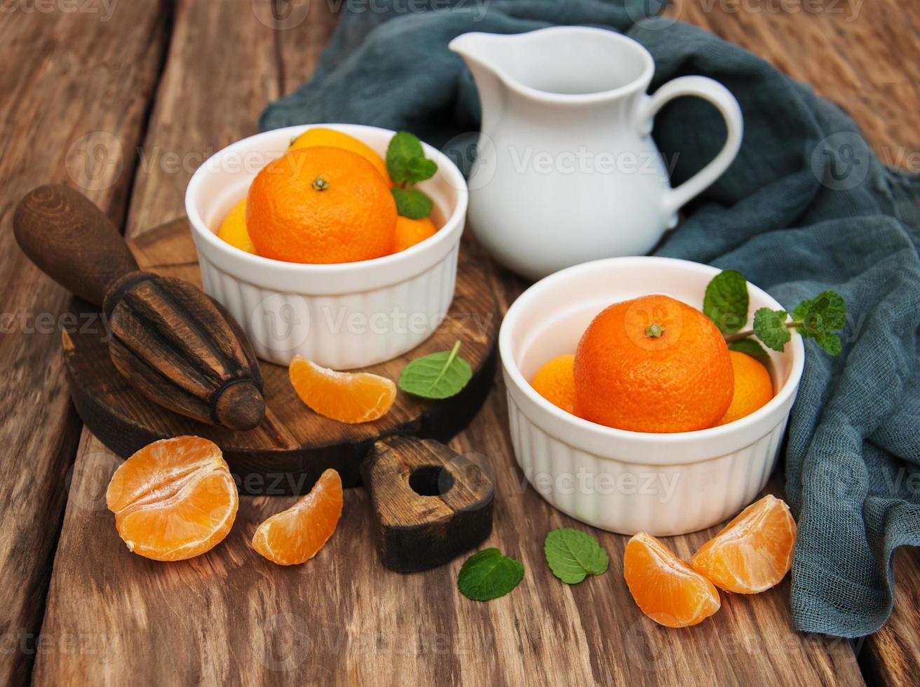 Tangerines and old juicer photo