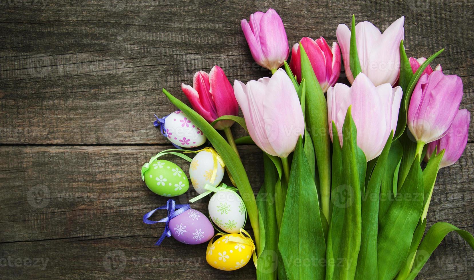 Easter eggs and tulips photo