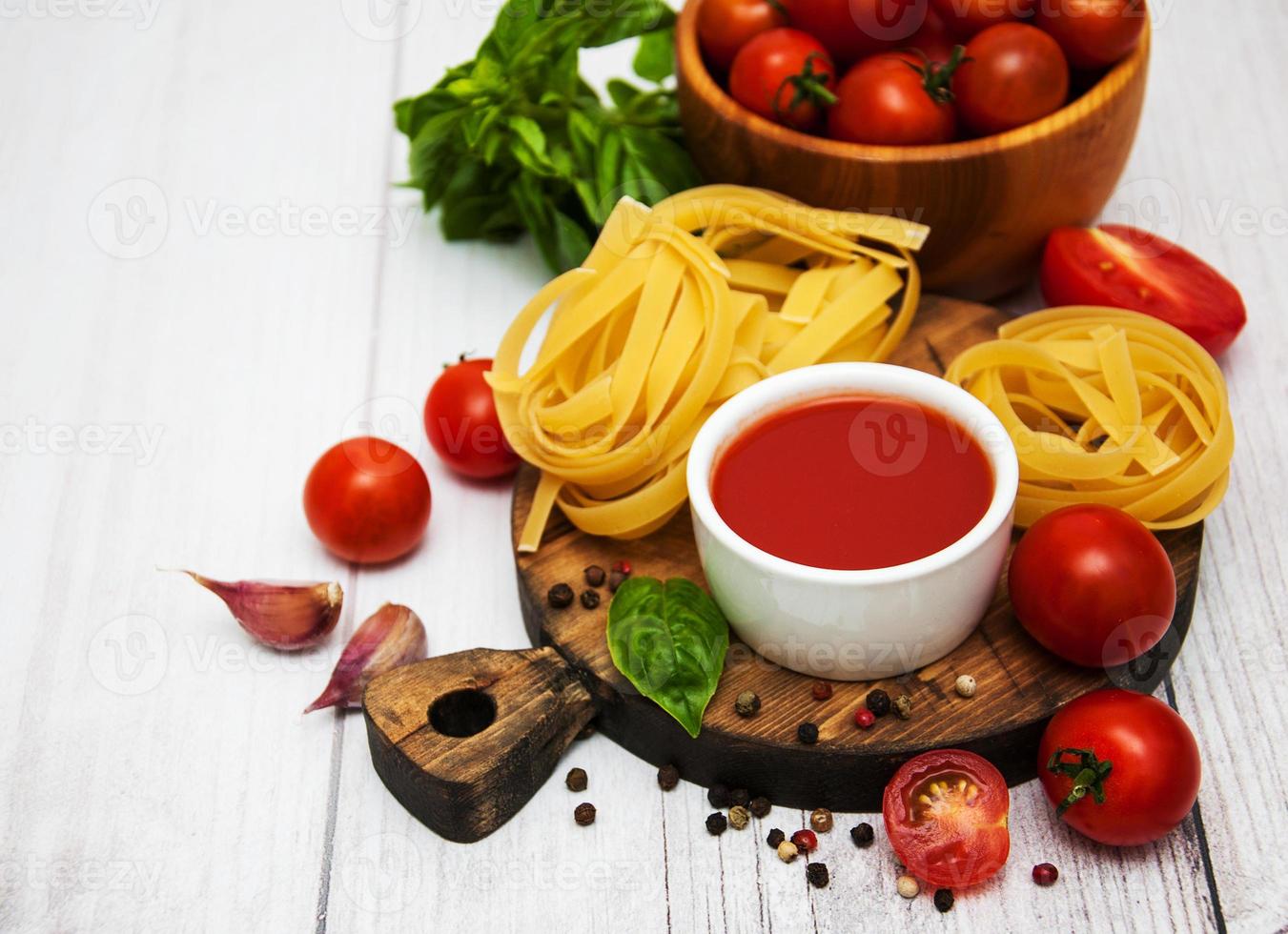 Bowl with tomato sauce photo