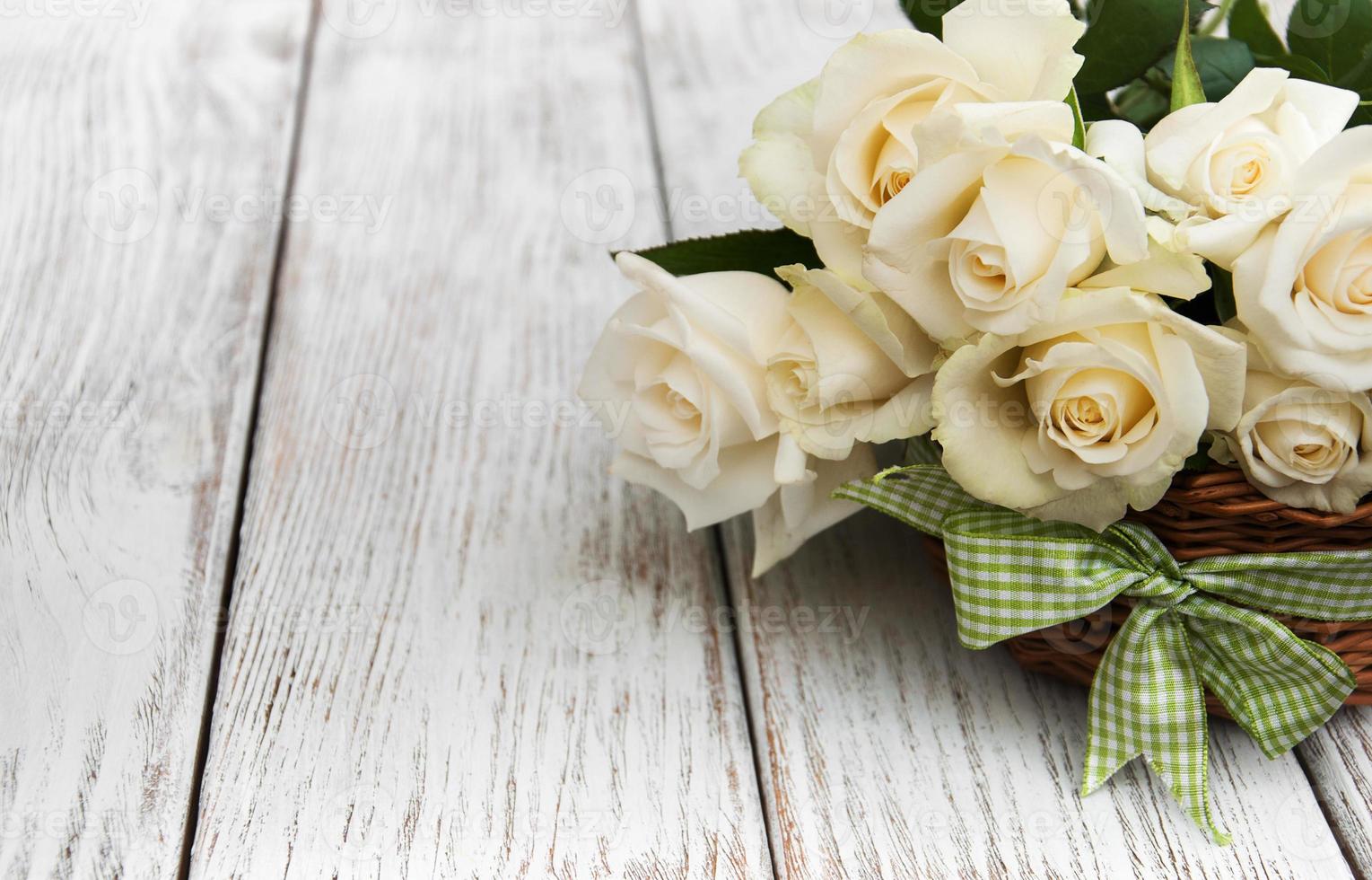 White roses in a basket photo