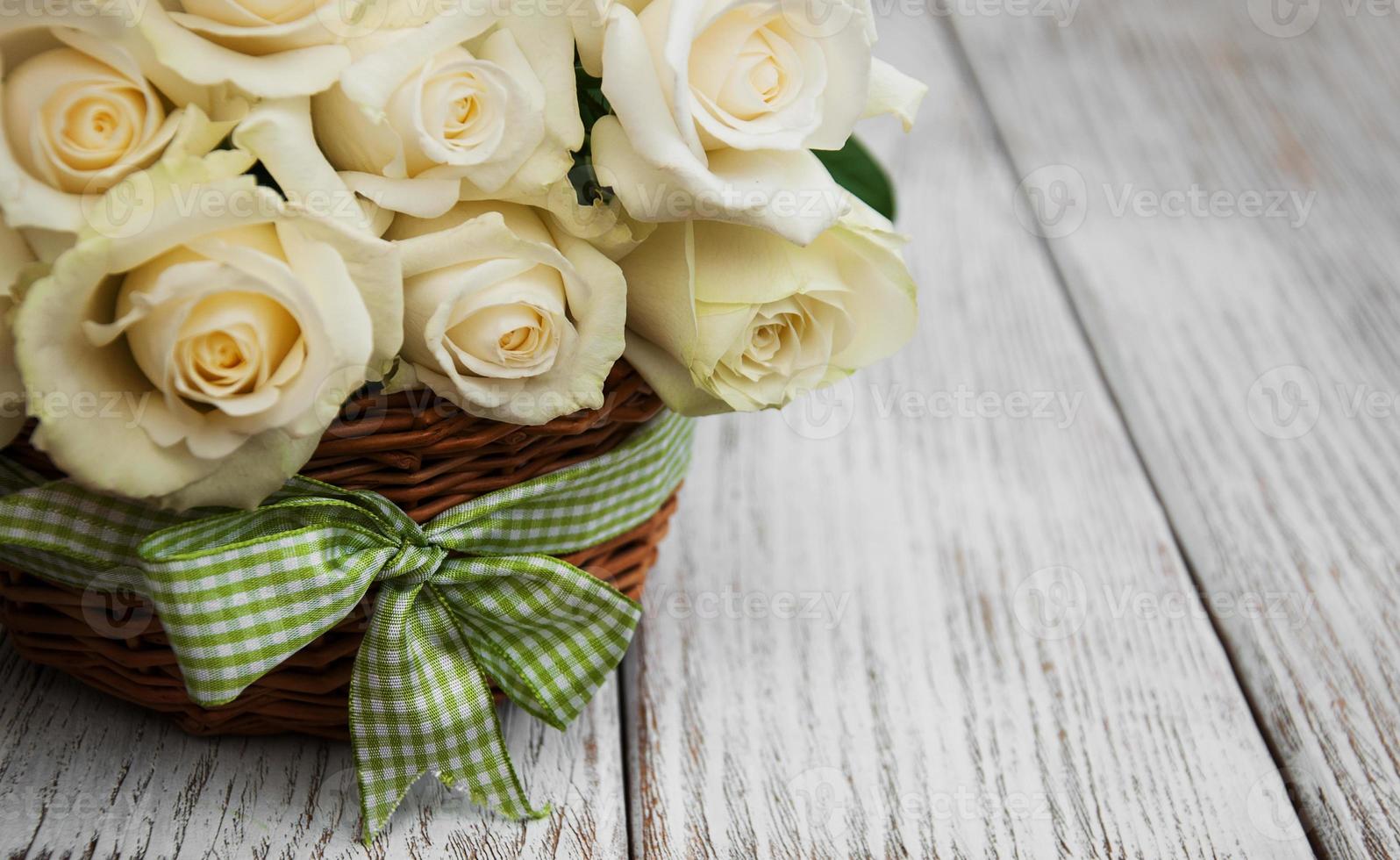 White roses in a basket photo