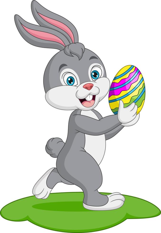 Cute little bunny carrying an easter egg in the grass 5918622 Vector ...