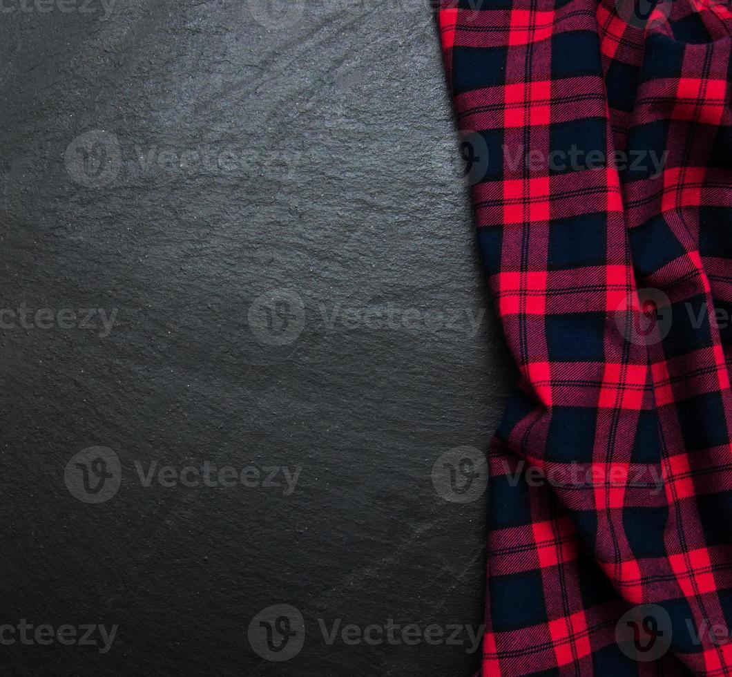 Checkered napkin on a black background photo