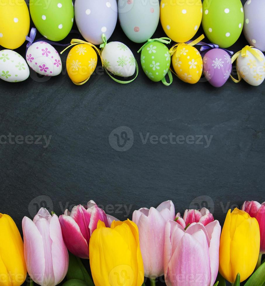 Easter eggs and tulips photo