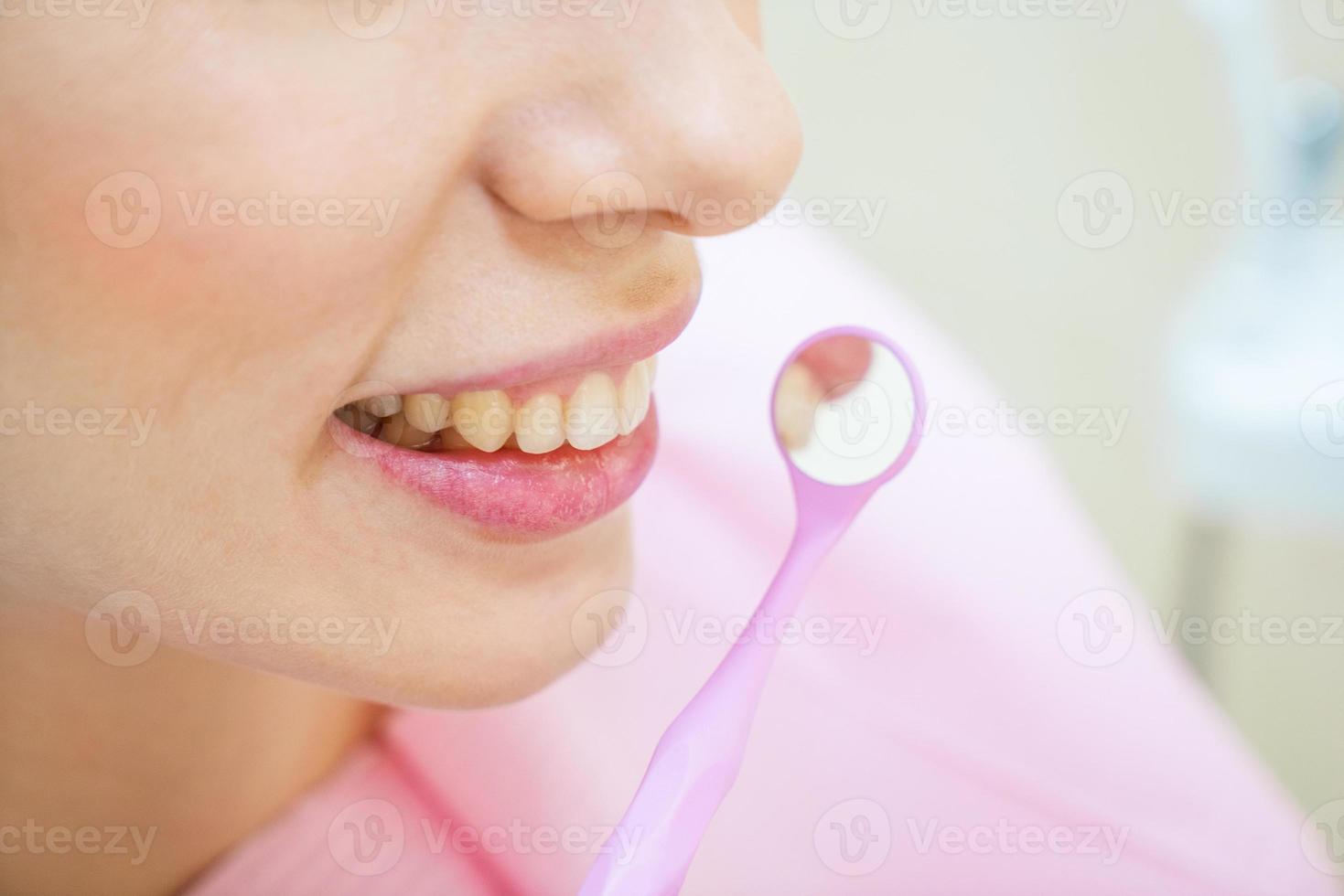 woman at the dentist for dental prevention photo
