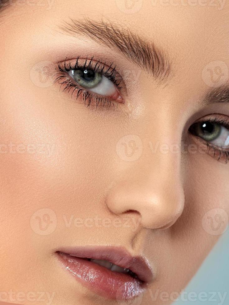 Beautiful woman face close up photo