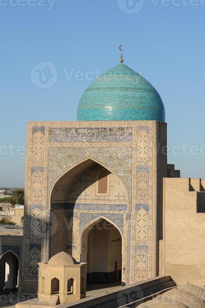 Ancient architecture of Central Asia and East. Dome in the old Eastern city. The ancient buildings of medieval Asia photo