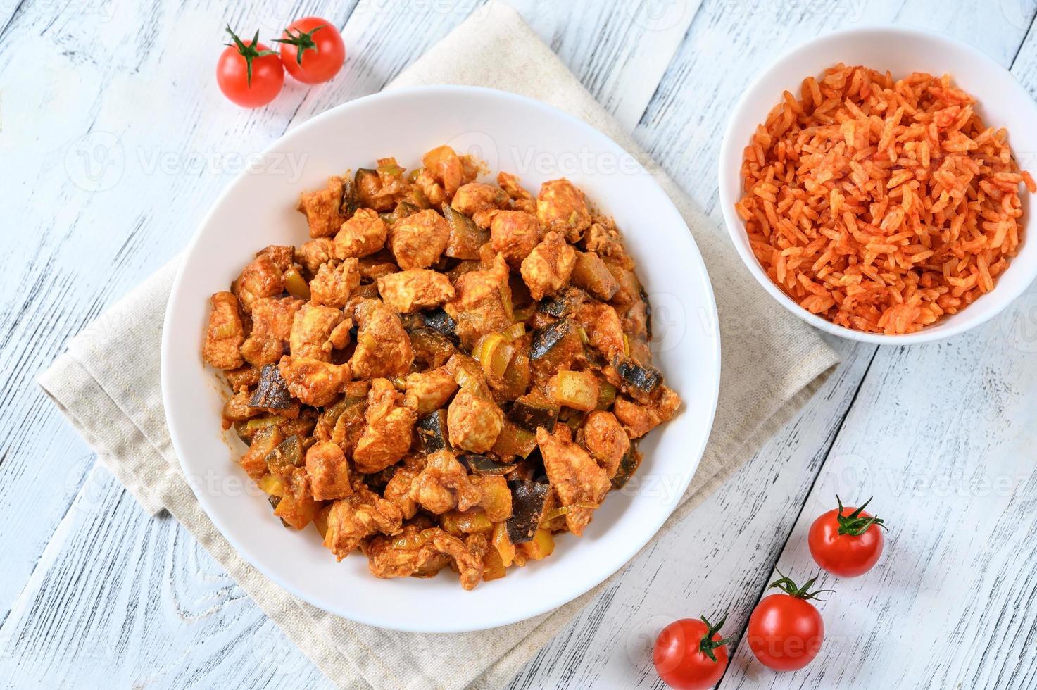 Bowl of red chicken curry photo