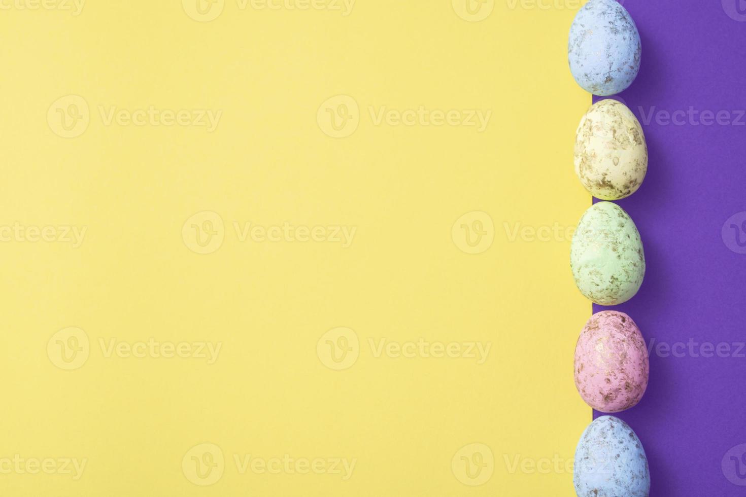 Easter eggs on a colored background. Festive banner with copyspace photo