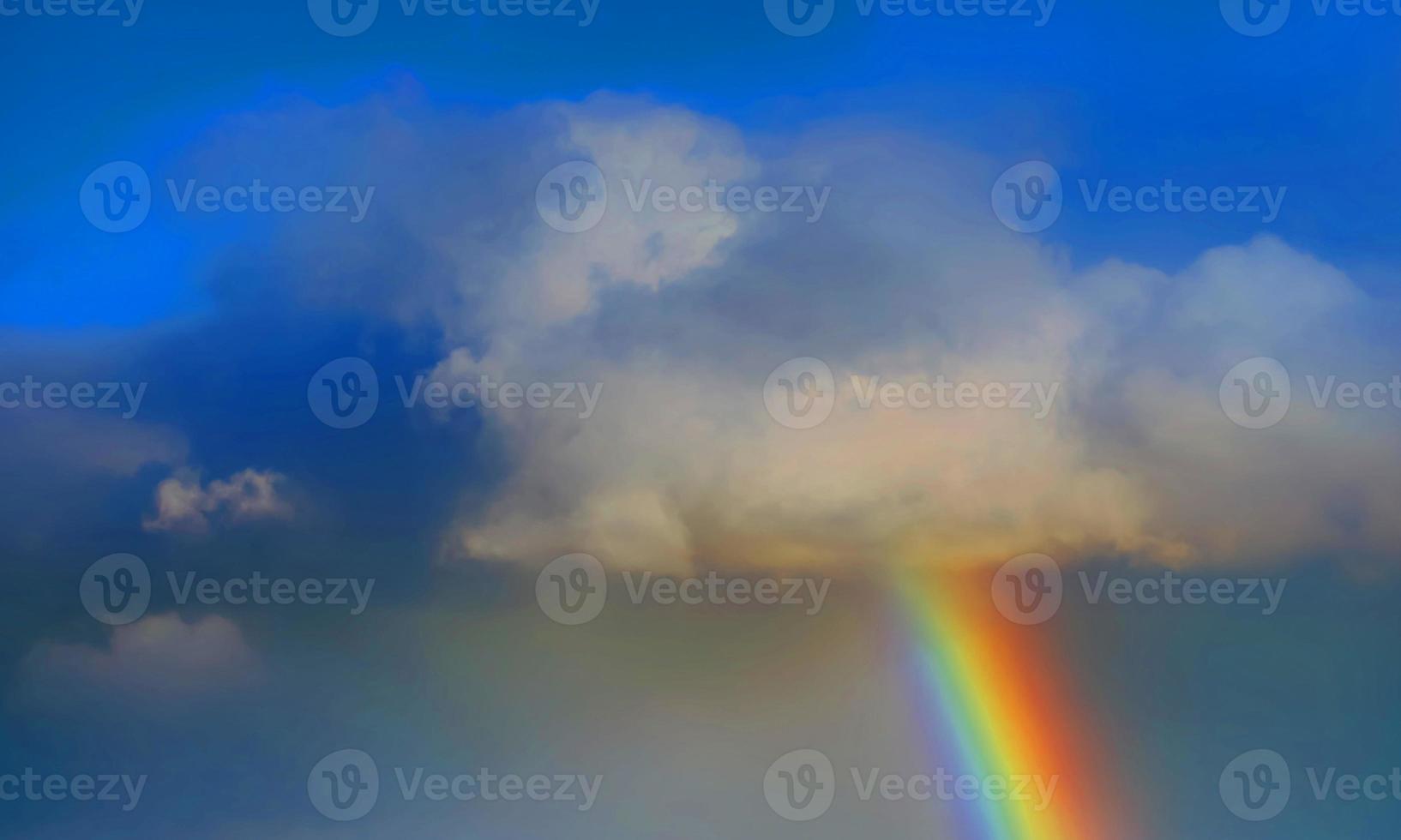 rainbow sky with some white clouds surface abstract flow thunder clouds in the light blue sky. photo