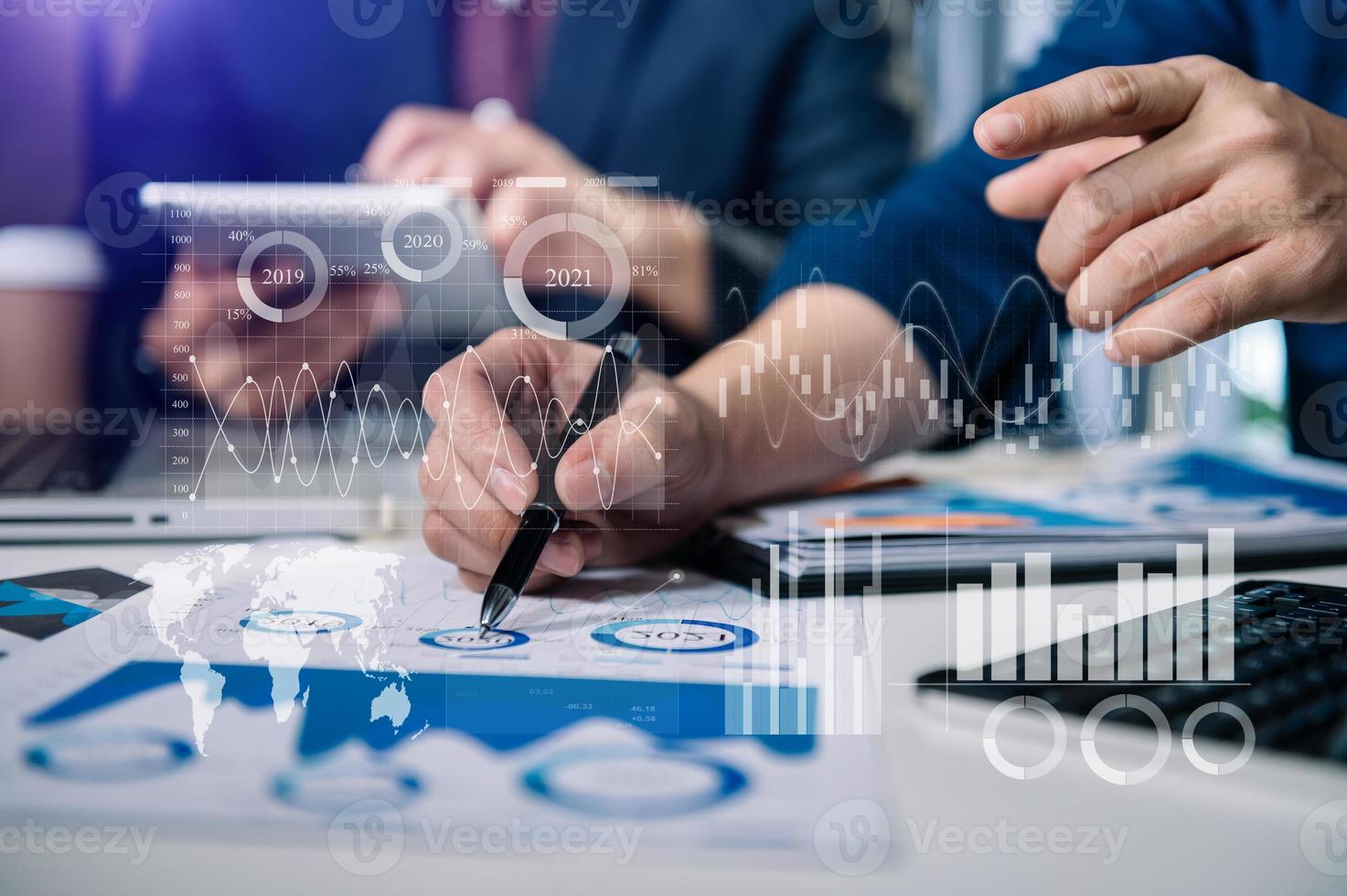 Investor analyzing stock market report and financial dashboard with business intelligence , with key performance indicatorsBusiness team meeting. photo