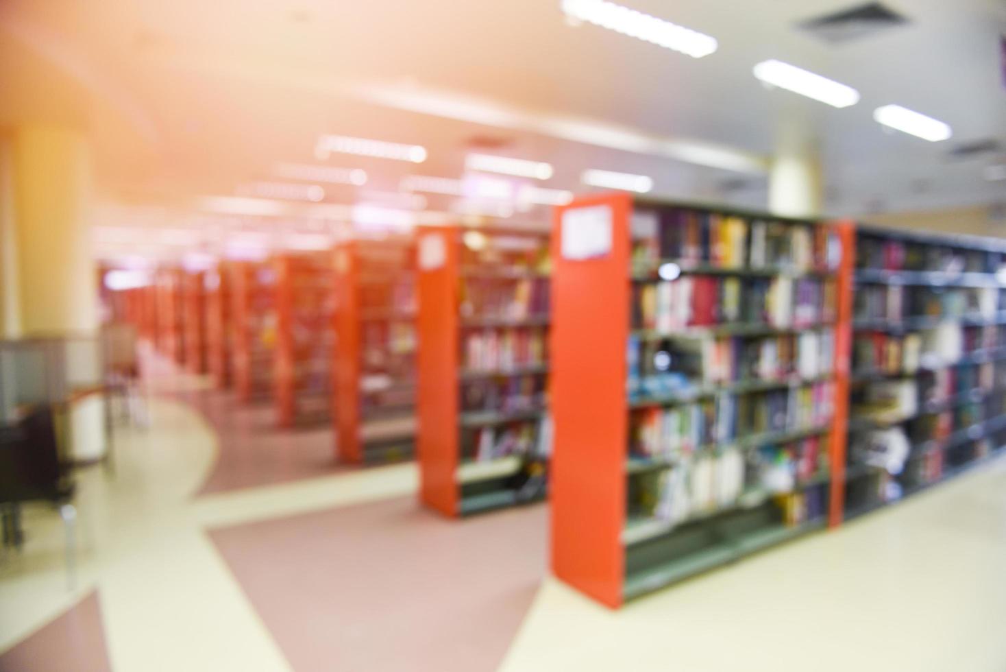 Library books - Blurred Image many books on bookshelf in library photo