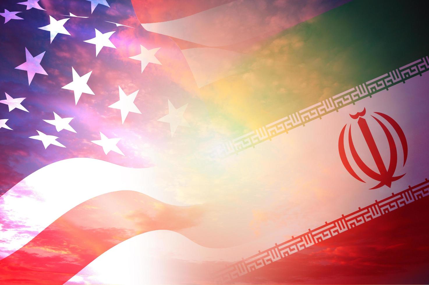 Concept of Conflict between USA and Iran war - US America and Iran flags on red cloud sky sunset background photo