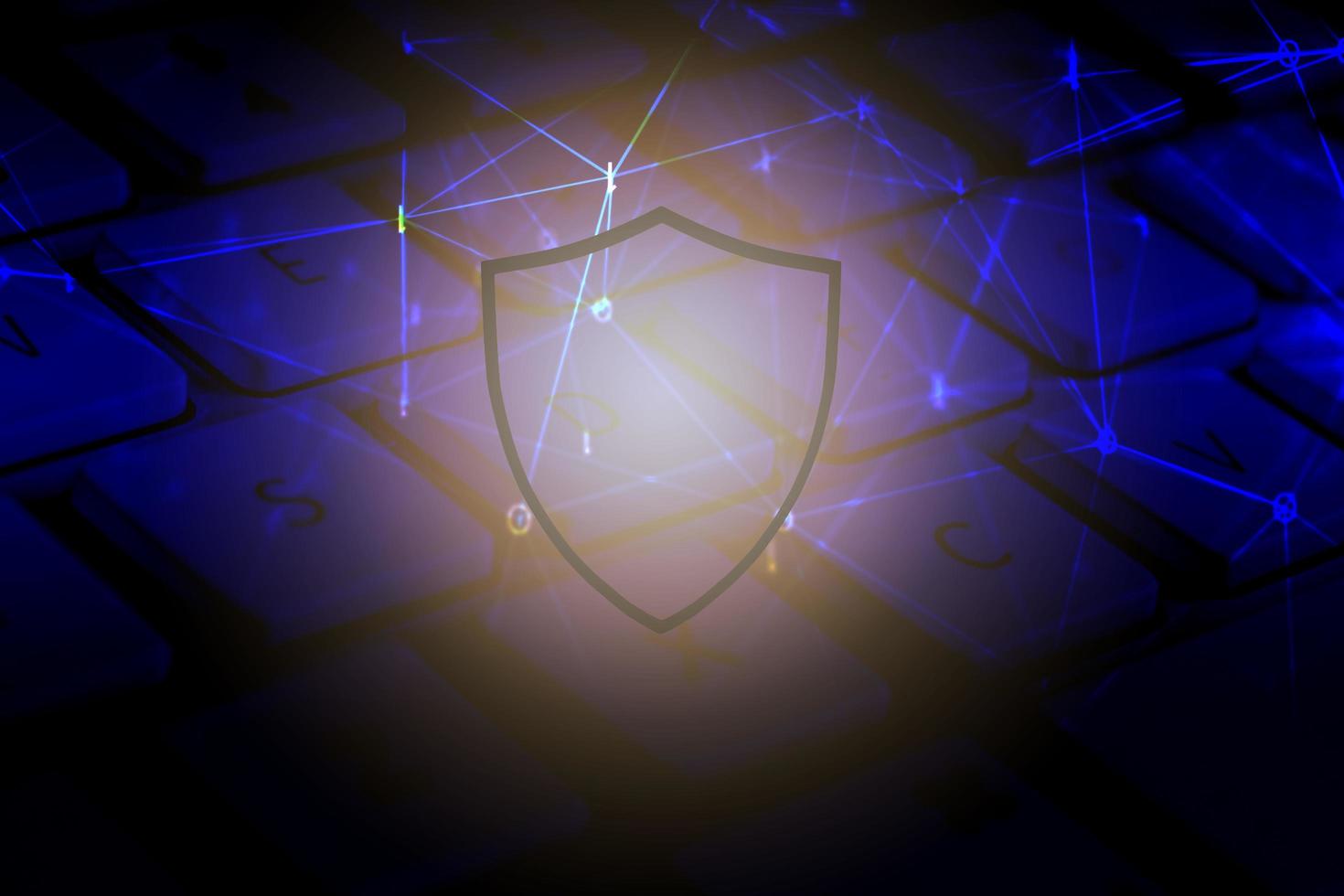 Data security systems computer with shield on keyboard for protect crime by an anonymous hacker internet and data network - technology background cyber security concept photo