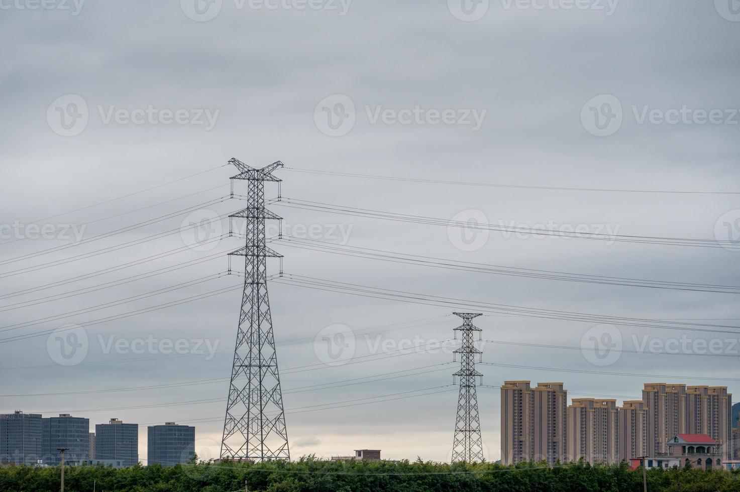 Cloudy days, power facilities in the fields, iron towers and telegraph poles photo
