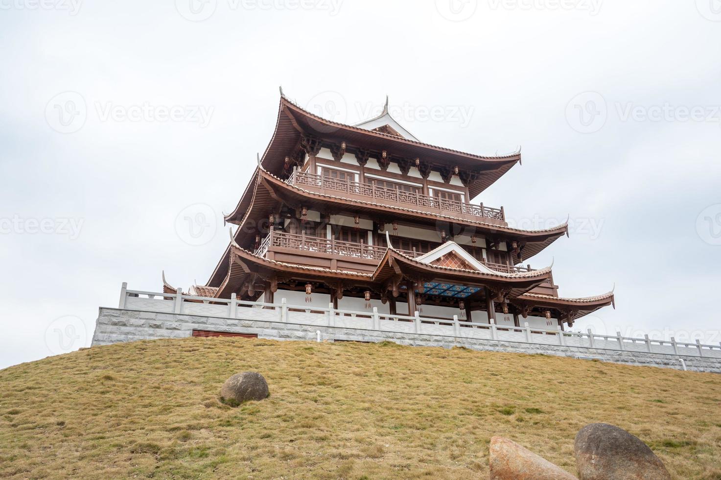 Multi storey wooden traditional attic building photo